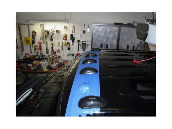 Measure 6.5 inches for each of the lines to mark the center hole. When you mark all the center holes, lay all of the LED cab lights in place to see if you like the look.