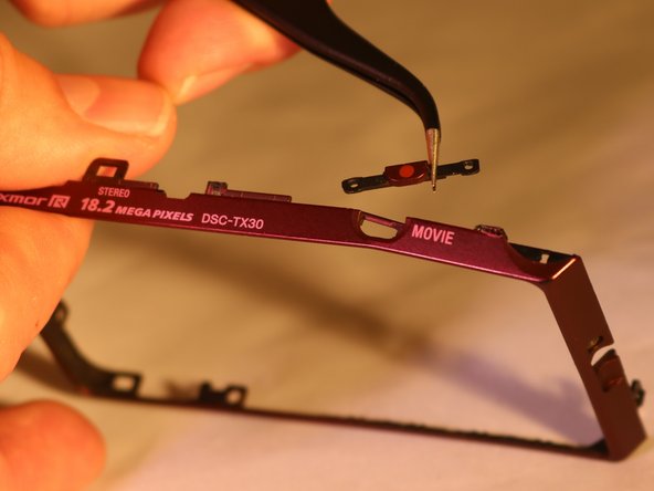 Sony Cyber-Shot DSC-TX30 Movie Button Replacement, Movie Button: crwdns2935265:015crwdnd2935265:02crwdnd2935265:02crwdne2935265:0