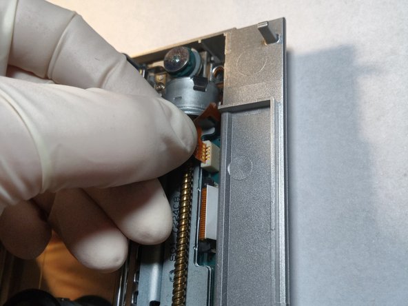 Sony Playstation 2 SCPH-77004 Laser Replacement, Disconnecting the drive part 2: crwdns2935265:011crwdnd2935265:03crwdnd2935265:03crwdne2935265:0