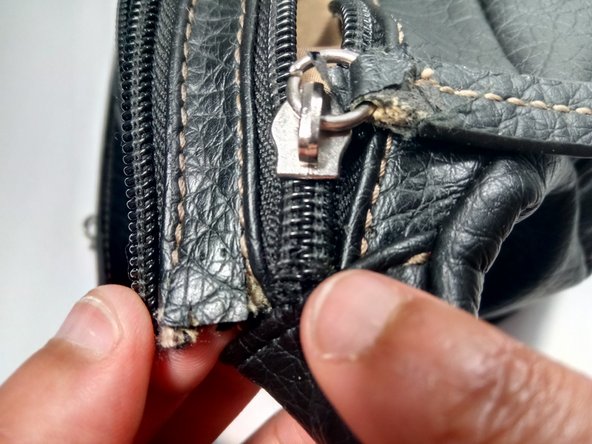 How to Sew a Hole and reattach zippers to a purse: step 7, image 2 of 2
