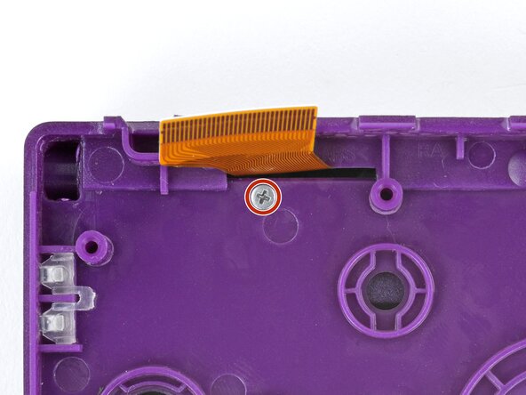 How to Reshell Your Game Boy Advance SP, Install the hinge cover screw: crwdns2935265:050crwdnd2935265:02crwdnd2935265:03crwdne2935265:0