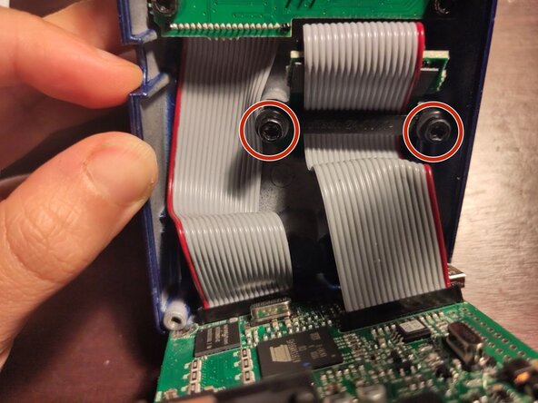 Rewriting corrupted firmware on Digitech JamMan Solo, Lift the board: crwdns2935265:03crwdnd2935265:02crwdnd2935265:03crwdne2935265:0