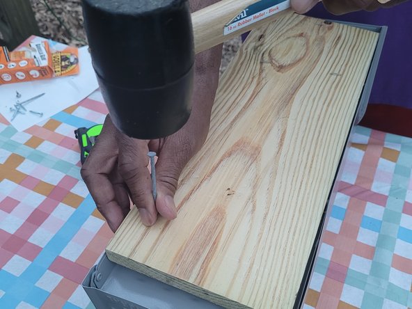 How to Reattach the Head of a Mailbox to the Base: step 4, image 2 of 3