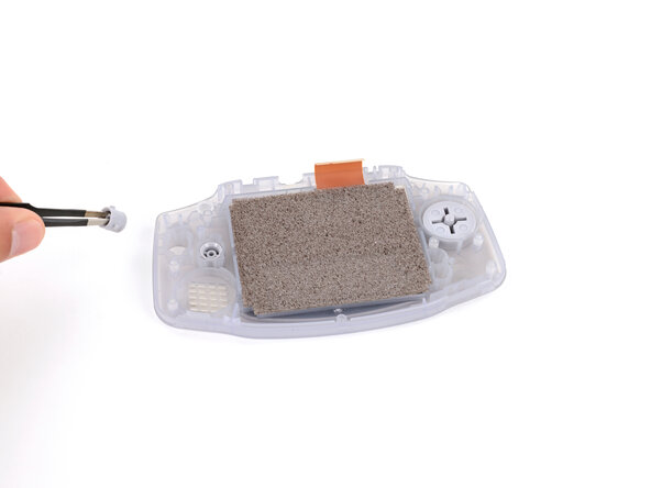 How to Reshell Your Game Boy Advance, Remove the buttons: crwdns2935265:014crwdnd2935265:01crwdnd2935265:03crwdne2935265:0