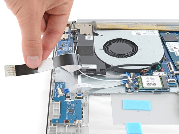 HP 15-dw Fan Replacement, Move the interconnect cable: crwdns2935265:018crwdnd2935265:02crwdnd2935265:02crwdne2935265:0