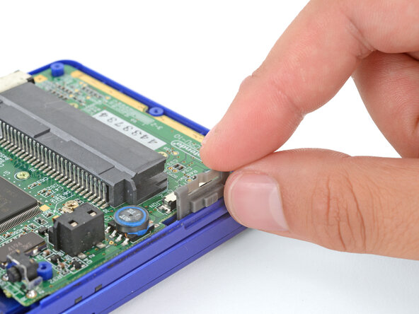 Nintendo Game Boy Advance SP Buttons Replacement, Remove the power switch cover: crwdns2935265:09crwdnd2935265:01crwdnd2935265:02crwdne2935265:0