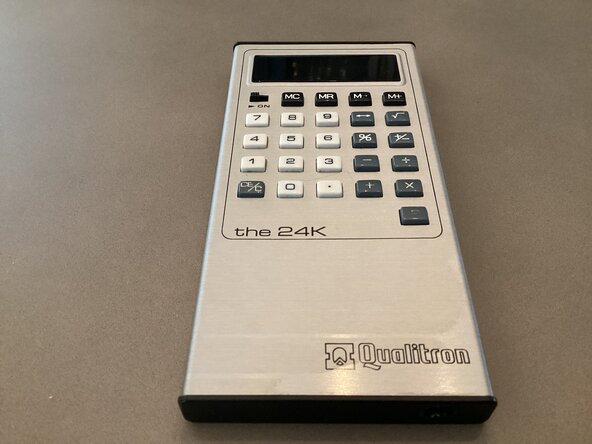 Qualitron 24K Calculator Teardown, Qualitron 24K Calculator Teardown: crwdns2935265:01crwdnd2935265:02crwdnd2935265:02crwdne2935265:0