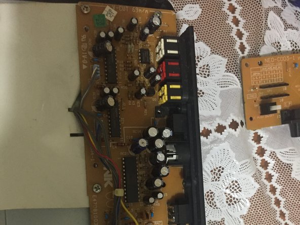 SNK Neo Geo CD Teardown, step 6: crwdns2935265:06crwdnd2935265:03crwdnd2935265:03crwdne2935265:0