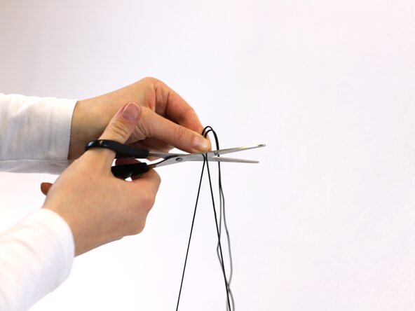 How to Replace a Dial-Lace System in a Hiking Boot, Measure the lace: crwdns2935265:010crwdnd2935265:02crwdnd2935265:02crwdne2935265:0