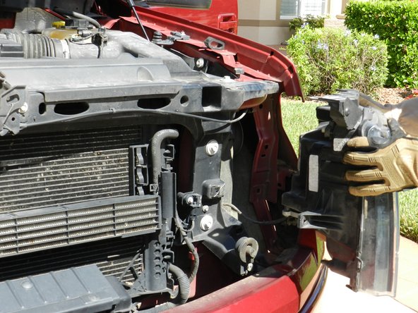 2009-2014 Ford F-150 Headlight Replacement: step 7, image 2 of 2