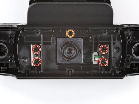 How to Open Your Logitech C920s Webcam, Remove the hinge screws: crwdns2935265:011crwdnd2935265:01crwdnd2935265:02crwdne2935265:0