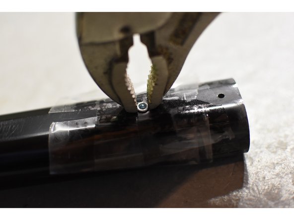 L.L.Bean Rolling Backpack Handle disassembly and lubrication, Removing the rivet: crwdns2935265:06crwdnd2935265:02crwdnd2935265:03crwdne2935265:0