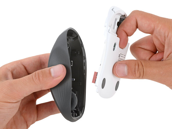 How to Open Your Logitech M310 Wireless Mouse, Separate the mouse halves: crwdns2935265:05crwdnd2935265:03crwdnd2935265:03crwdne2935265:0