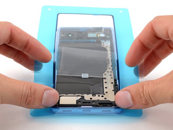 How to Apply Rear Cover Adhesive in Your Google Pixel 7a, Apply the perimeter adhesive: crwdns2935265:07crwdnd2935265:03crwdnd2935265:03crwdne2935265:0