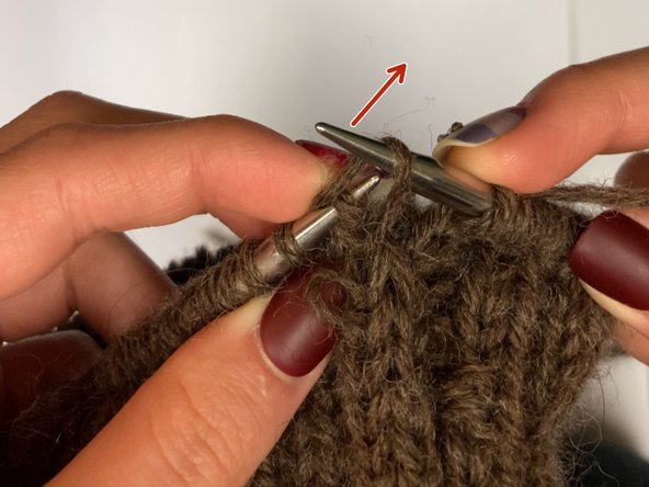 How to Pick Up a Dropped Stitch in Knitting: step 5, image 2 of 2