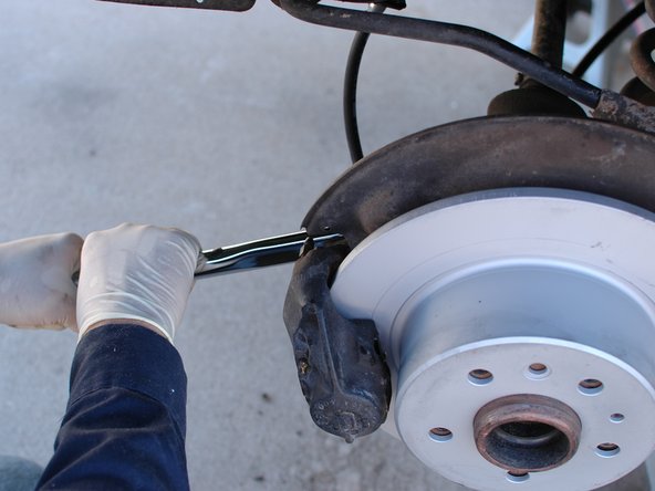 Mercedes W123 Brake Disc, Rear Replacement, Re-install the caliper: crwdns2935265:06crwdnd2935265:03crwdnd2935265:03crwdne2935265:0