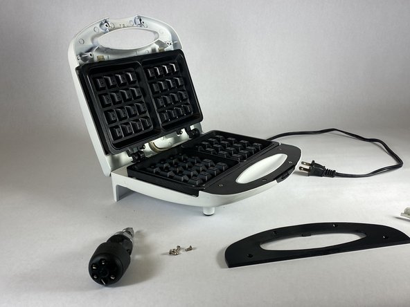 Kitchen Gourmet Waffle Maker Release Latch Spring Replacement: step 5, image 3 of 3