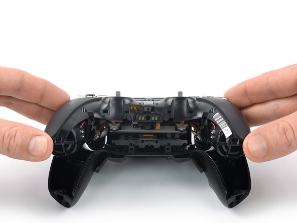 Scuf Reflex Battery Replacement, Remove the front cover assembly: crwdns2935265:016crwdnd2935265:02crwdnd2935265:03crwdne2935265:0