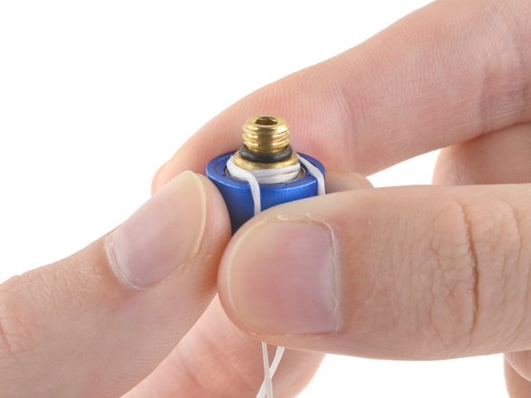 How to Reattach the Cap on a 4 mm iFixit Precision Bit Driver, Arrange and hold the ends of the floss: crwdns2935265:04crwdnd2935265:02crwdnd2935265:03crwdne2935265:0