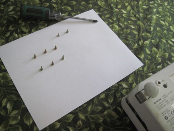 Sharp PG-A10X Thermal Fuse Replacement, Pry the case apart: crwdns2935265:04crwdnd2935265:03crwdnd2935265:03crwdne2935265:0