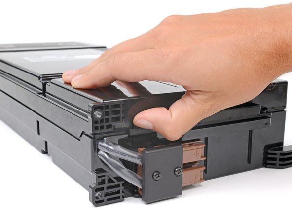 APC Smart-UPS SRT30000XLA Battery Cells Replacement, Unclip the top shell: step 13, image 2 of 3
