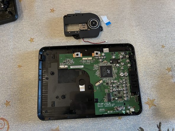 Sony DVP-FX820 Full Teardown, Detaching the Laser: crwdns2935265:07crwdnd2935265:03crwdnd2935265:03crwdne2935265:0