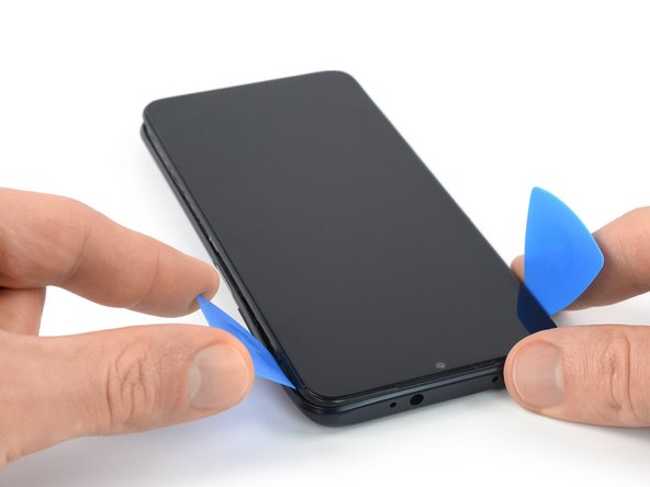 Xiaomi Redmi Note 9T Screen Replacement, Release the right edge plastic clips: crwdns2935265:07crwdnd2935265:03crwdnd2935265:03crwdne2935265:0