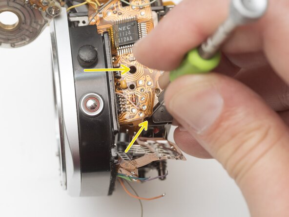 Pentax Super Program Front Lens Board Removal, Remove mirror governor: crwdns2935265:022crwdnd2935265:02crwdnd2935265:03crwdne2935265:0