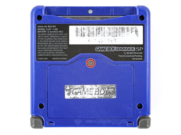 Nintendo Game Boy Advance SP Bottom Shell Replacement, Remove the battery cover: crwdns2935265:02crwdnd2935265:01crwdnd2935265:02crwdne2935265:0