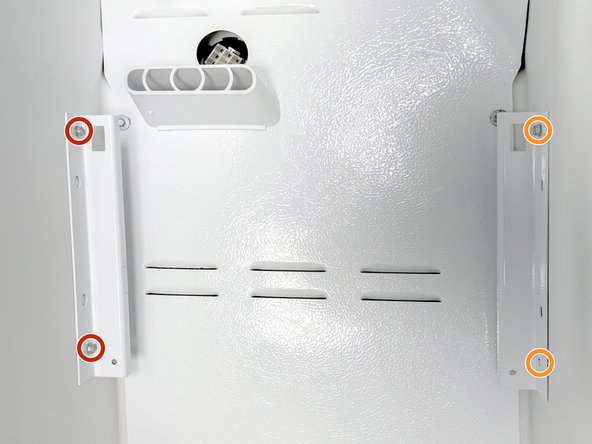 Frigidaire Side-By-Side Refrigerator Evaporator Fan Cover Removal, Remove mounting brackets: crwdns2935265:012crwdnd2935265:02crwdnd2935265:02crwdne2935265:0