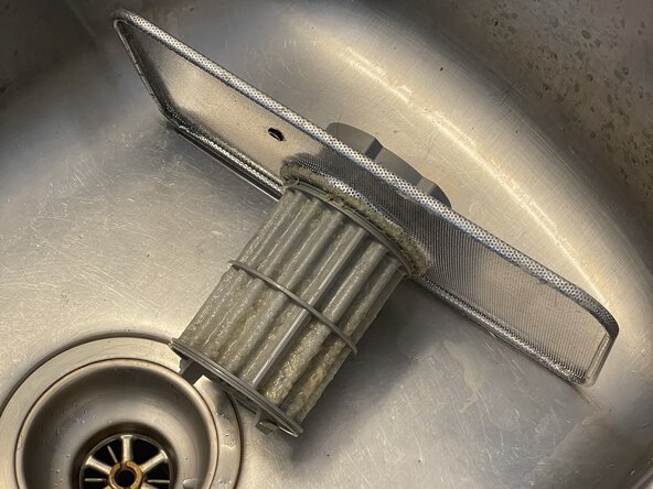 How to Unclog a Bosch SHEM78WH5N/52 Dishwasher Drain Filter: step 2, image 3 of 3