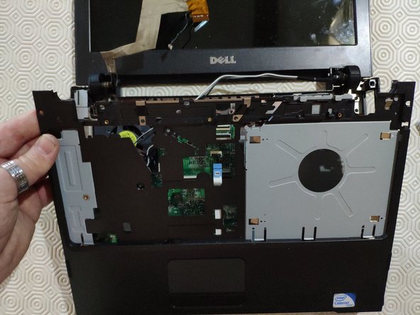 Dell Vostro 1220 Hard Drive Replacement, Remove the upper part of the shell: crwdns2935265:09crwdnd2935265:02crwdnd2935265:02crwdne2935265:0