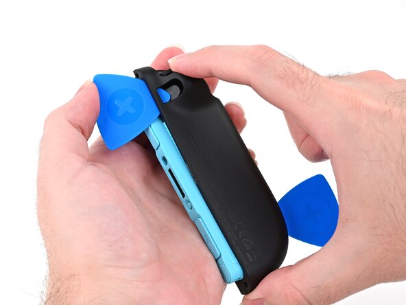 Joy-Con 2 (Left) Battery Replacement, Release the back cover: crwdns2935265:09crwdnd2935265:01crwdnd2935265:03crwdne2935265:0