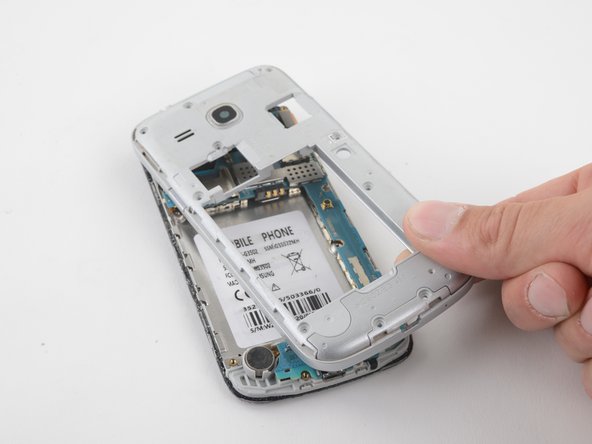 Samsung Galaxy Core Plus Motherboard Replacement, Remove the midframe: crwdns2935265:010crwdnd2935265:01crwdnd2935265:02crwdne2935265:0