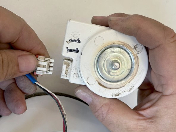 Samsung Older French Door Refrigerator Condenser Fan Replacement, Disconnect the motor from the motor assembly: step 15, image 3 of 3