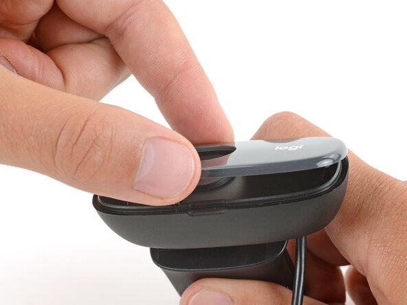 How to Open Your Logitech C270 Webcam, Remove the front cover: crwdns2935265:02crwdnd2935265:02crwdnd2935265:03crwdne2935265:0