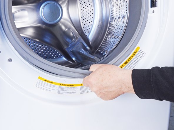 How to Clean the Rubber Boot in Your LG WM3050CW Washing Machine, Pull the boot: step 6, image 2 of 2