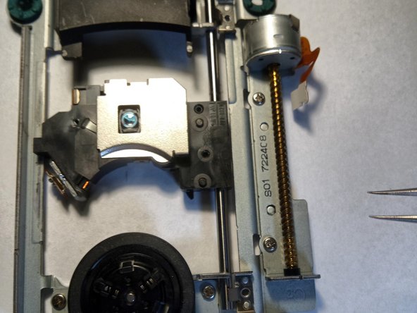 Sony Playstation 2 SCPH-77004 Laser Replacement, Unscrewing the drive: crwdns2935265:013crwdnd2935265:02crwdnd2935265:02crwdne2935265:0