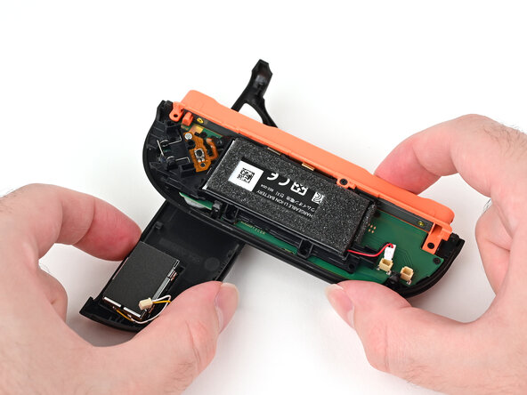 Joy-Con 2 (Right) Joystick Replacement, Prop up the controller: crwdns2935265:017crwdnd2935265:03crwdnd2935265:03crwdne2935265:0