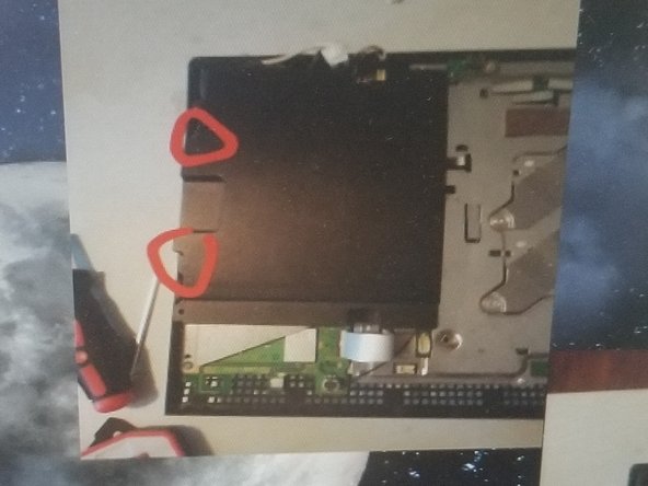 PlayStation 3 Teardown, remove power supply screw: stap 0, afbeelding 2 van 3