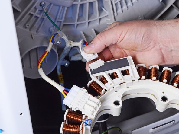 LG Front Load Washing Machine Stator Replacement, Disconnect the stator: crwdns2935265:010crwdnd2935265:02crwdnd2935265:03crwdne2935265:0