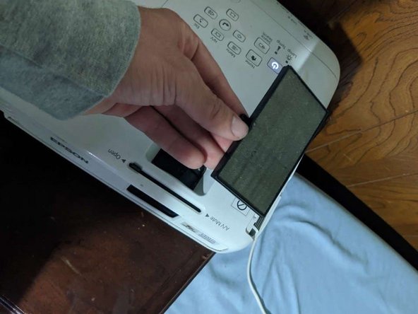Epson PowerLite Home Cinema 1040 Projector Air Filter Replacement: step 4, image 1 of 2