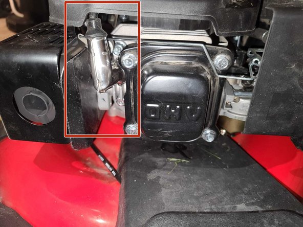 Detach the spark plug wire if tilting the mower for drainage.[ It's located in the front of the lawnmower-right on the left hand side of the air filter].