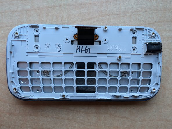 LG Extravert 2 Teardown, Unscrew the sliding mechanism from the shell: crwdns2935265:010crwdnd2935265:02crwdnd2935265:02crwdne2935265:0