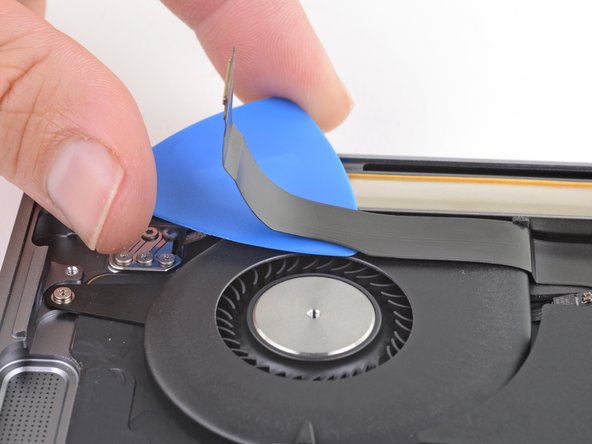 MacBook Air 13” Retina Display Late 2018 Fan Replacement, Separate the audio board cable: crwdns2935265:014crwdnd2935265:02crwdnd2935265:03crwdne2935265:0