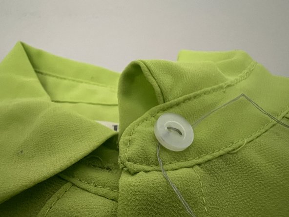 How to Replace a Button on a Shirt: crwdns2935265:05crwdnd2935265:03crwdnd2935265:03crwdne2935265:0
