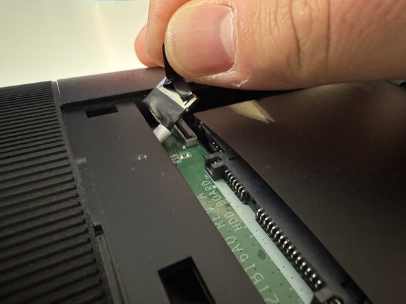 Dell Inspiron 20 3043 CMOS Battery Replacement, Remove the hard drive cover and connector: step 2, image 2 of 2