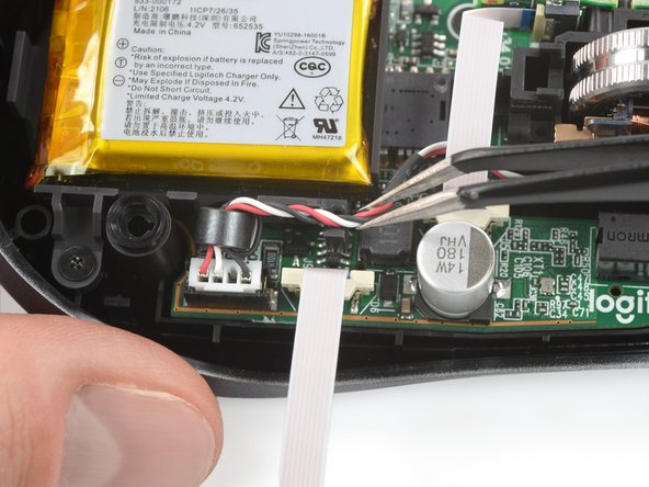 Logitech MX Anywhere 3 for Mac Battery Replacement, Reposition the wheel assembly cable: crwdns2935265:011crwdnd2935265:02crwdnd2935265:02crwdne2935265:0