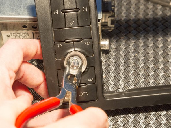 Disassembling Audi Navigation Plus unit, Removing the rotary push buttons: step 19, image 3 of 3