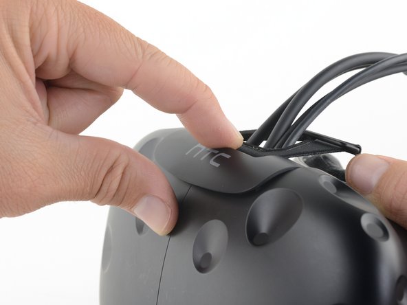 HTC Vive Compartment Cover Assembly Replacement, Open the cable compartment: crwdns2935265:03crwdnd2935265:02crwdnd2935265:03crwdne2935265:0